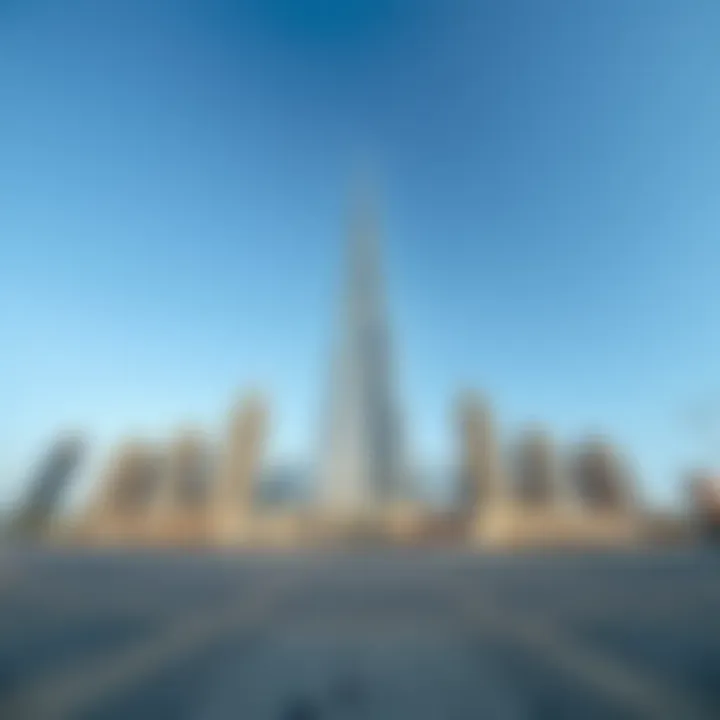 Majestic Ground View of Burj Al Sharq A panoramic view of Burj Al Sharq from the ground, showcasing its grandeur against a clear sky.